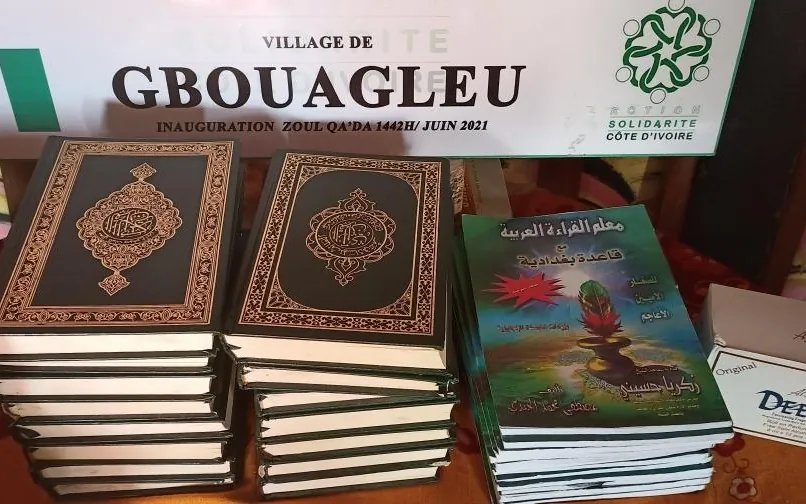 Copies of the Qur’an handed to a village