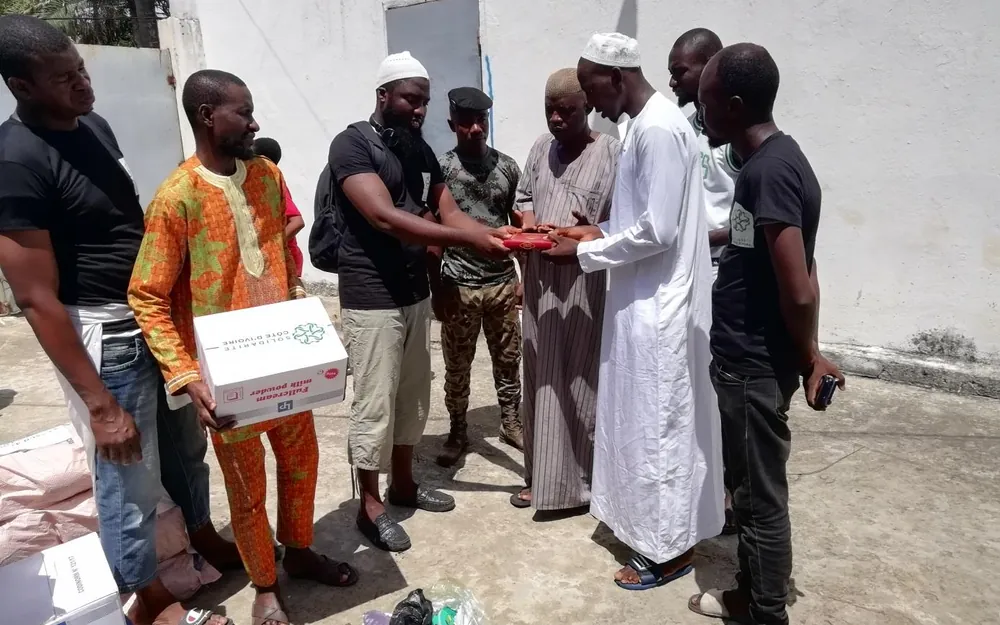 Handing over gifts to families
