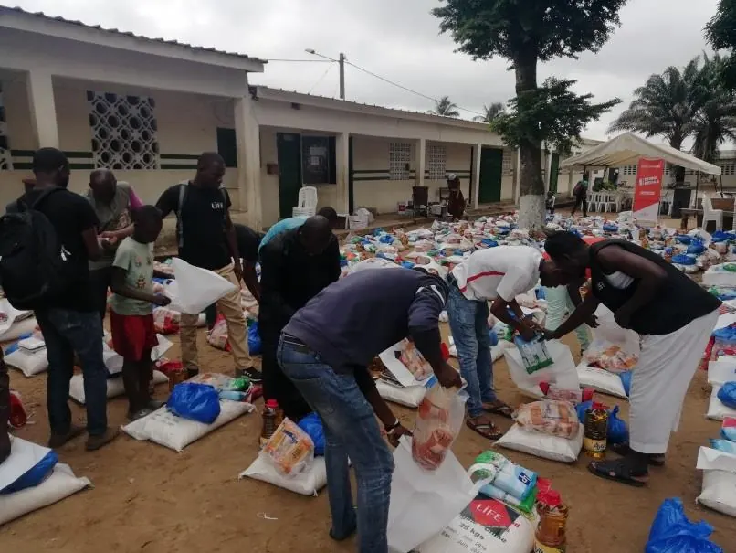 Volunteers prepare the parcels on site