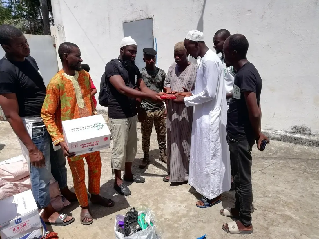 Handing parcels to families