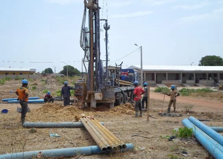 The team at work around the rig