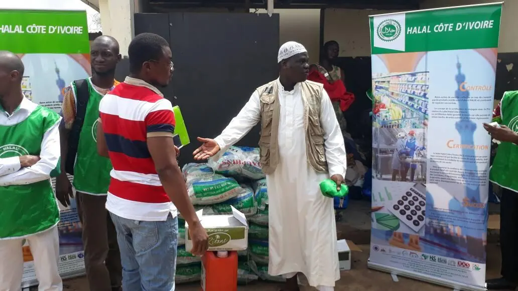 Handing kits to a community leader