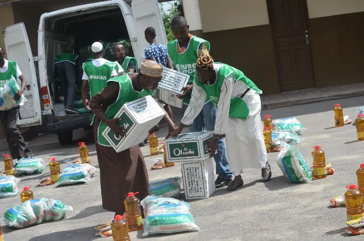 Volunteers sort the kits before distributing them