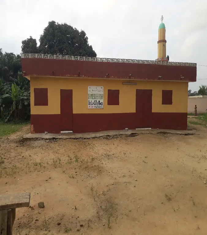 A finished mosque with its minaret