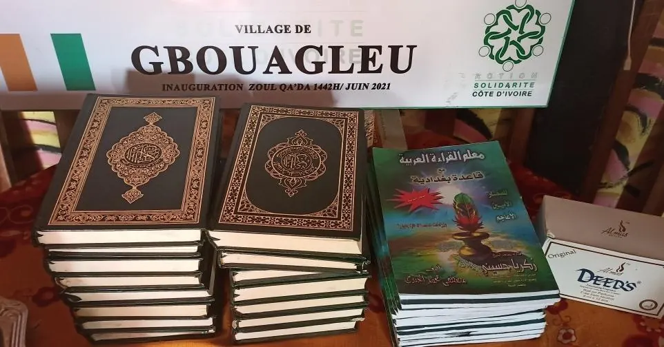 Copies of the Qur’an handed to a village